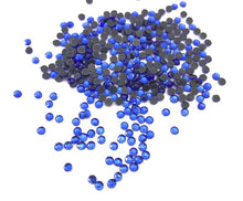 Load image into Gallery viewer, Sapphire HotFix Rhinestone SS7 https://www.artbeecrafts.com/products/copy-of-crystal-glass-hotfix-rhinestones-7ss-flatblack-1440pcs Hotfix Rhinestones are one of the easiest ways to add sparkle to your apparel designs, purses, cell phones, belts, dolls, scrapbooks, nail art, tumblers and much more! Stones are heat set and already have glue on the back. Easy to apply with hot fix applicator or a household iron.