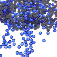 Load image into Gallery viewer, Sapphire HotFix Rhinestone SS7 https://www.artbeecrafts.com/products/copy-of-crystal-glass-hotfix-rhinestones-7ss-flatblack-1440pcs Hotfix Rhinestones are one of the easiest ways to add sparkle to your apparel designs, purses, cell phones, belts, dolls, scrapbooks, nail art, tumblers and much more! Stones are heat set and already have glue on the back. Easy to apply with hot fix applicator or a household iron. www.ArtBeeCrafts.com
