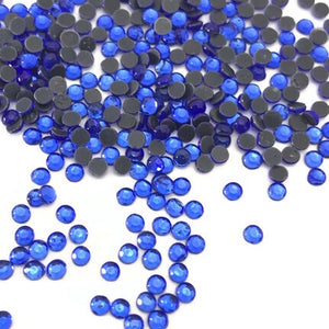 Sapphire HotFix Rhinestone SS7 https://www.artbeecrafts.com/products/copy-of-crystal-glass-hotfix-rhinestones-7ss-flatblack-1440pcs Hotfix Rhinestones are one of the easiest ways to add sparkle to your apparel designs, purses, cell phones, belts, dolls, scrapbooks, nail art, tumblers and much more! Stones are heat set and already have glue on the back. Easy to apply with hot fix applicator or a household iron. www.ArtBeeCrafts.com